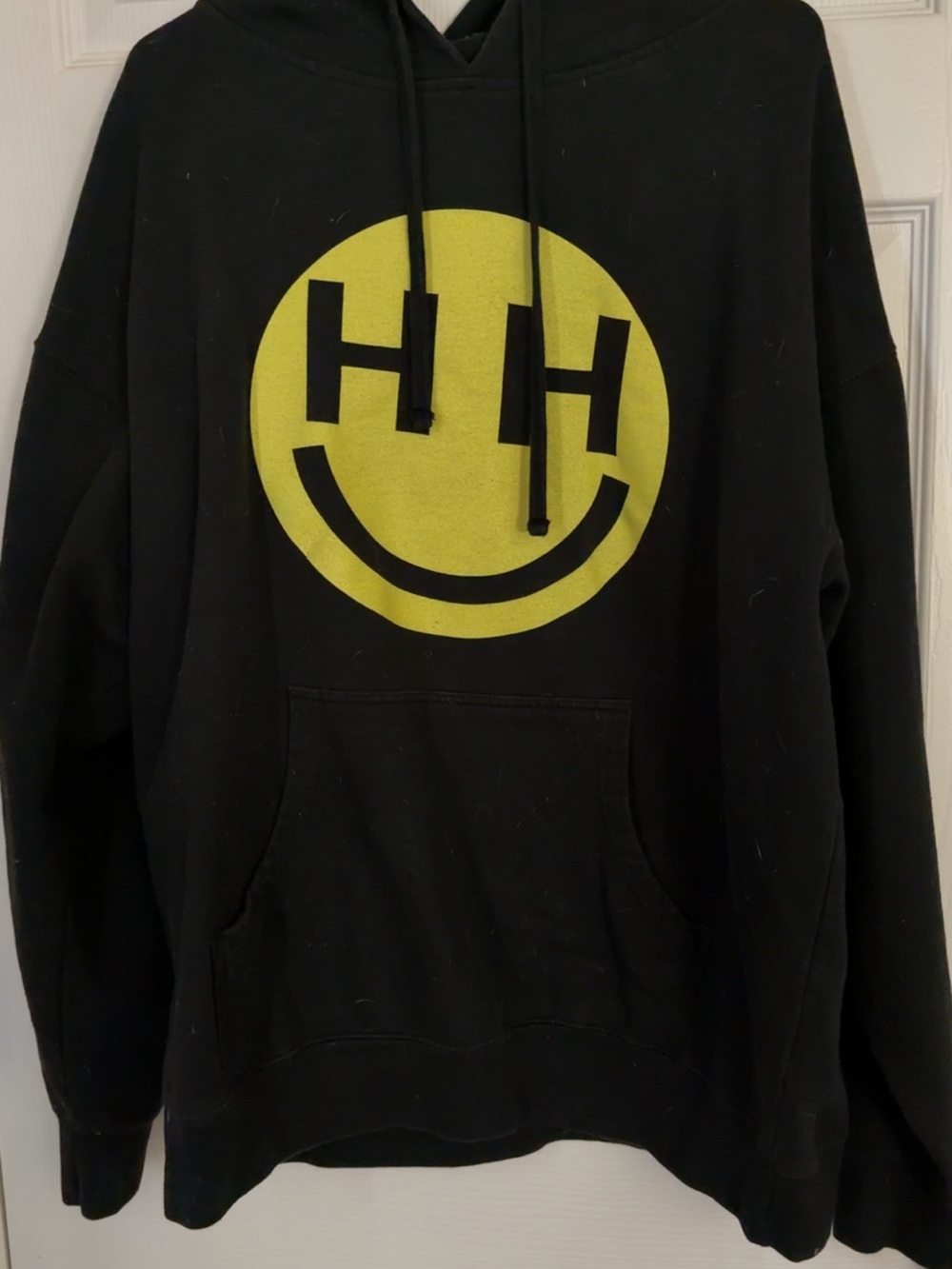 Miley Cyrus & Max Azria Black Hoodie with Yellow Smiley Graphic